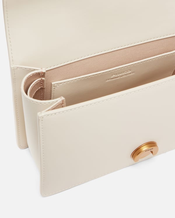 Love Bag small crossbody bag in leather with straps
