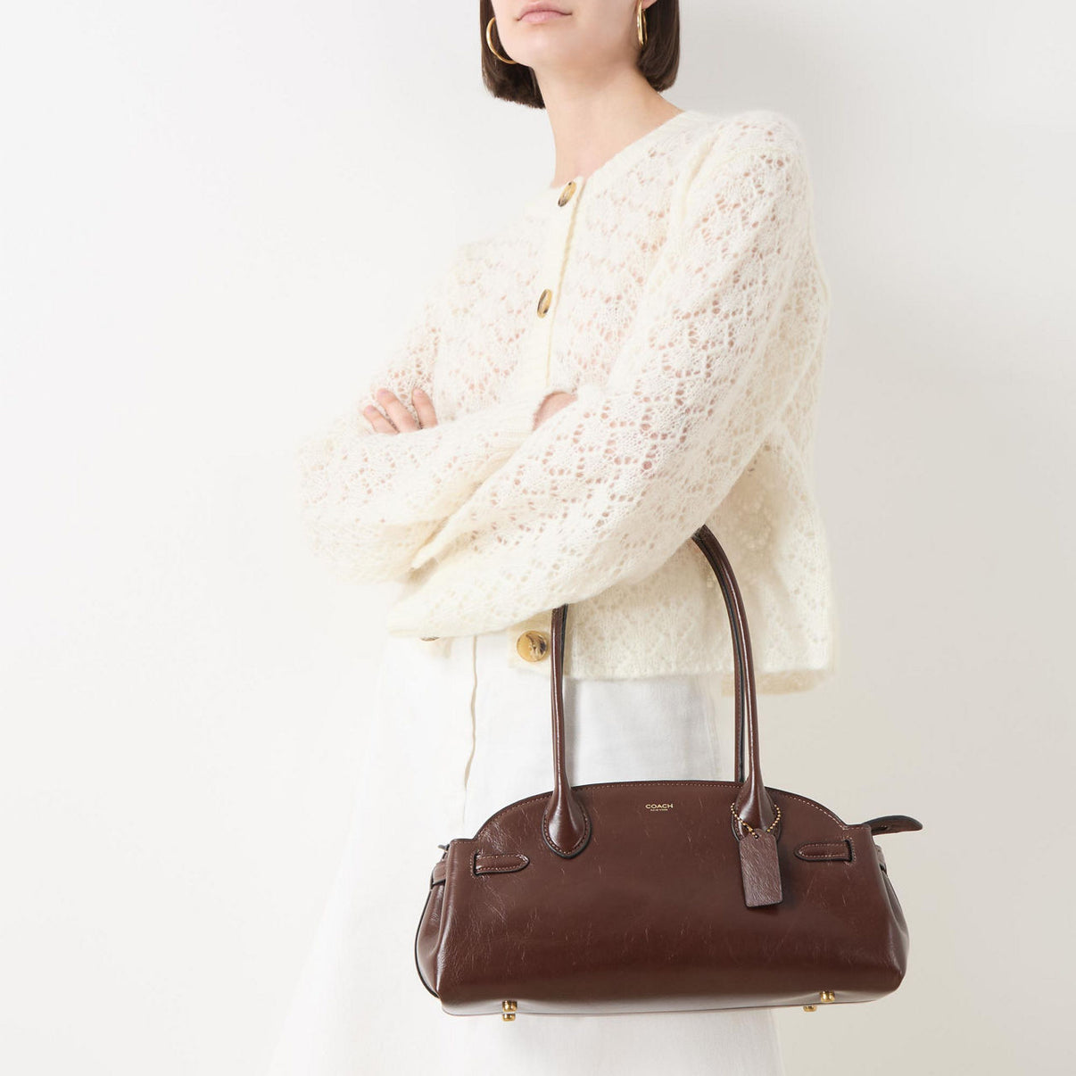 COACH
Empire carryall 34 glazed leather shoulder bag