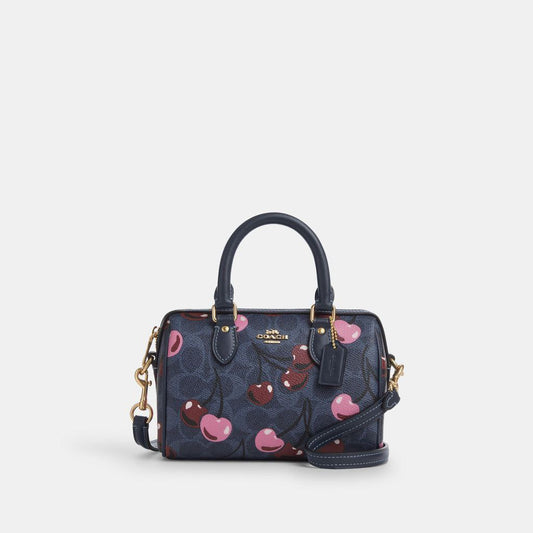 Mini Rowan Crossbody Bag In Signature Canvas With Cherry Print