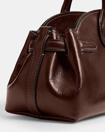COACH
Empire carryall 34 glazed leather shoulder bag