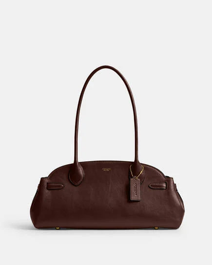 COACH
Empire carryall 34 glazed leather shoulder bag