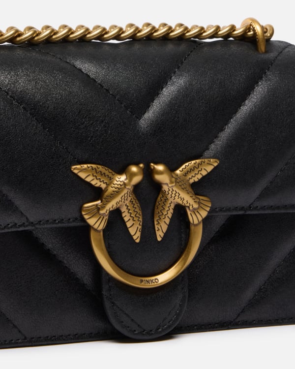Love Bag mini crossbody bag in distressed-effect leather