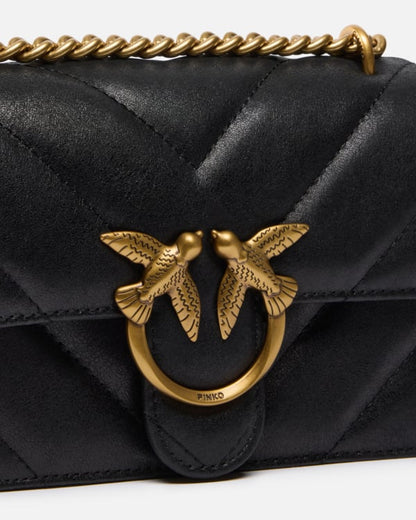 Love Bag mini crossbody bag in distressed-effect leather